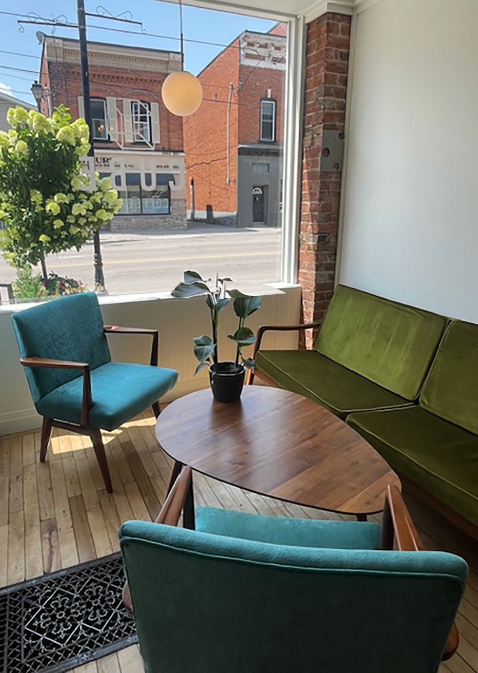 green-couch-sunset-window-coffee-shop-cube-tweed-photograpjhy